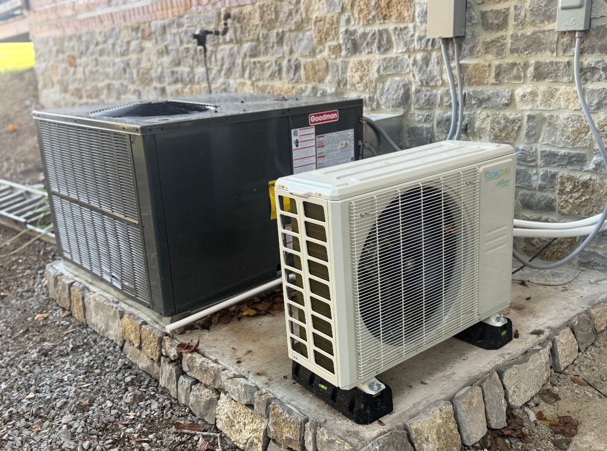 A clean outdoor air conditioner unit after a successful AC tune-up by Professional Heating and Cooling in Nashville.